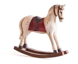 Antique toy rocking horse isolated on white